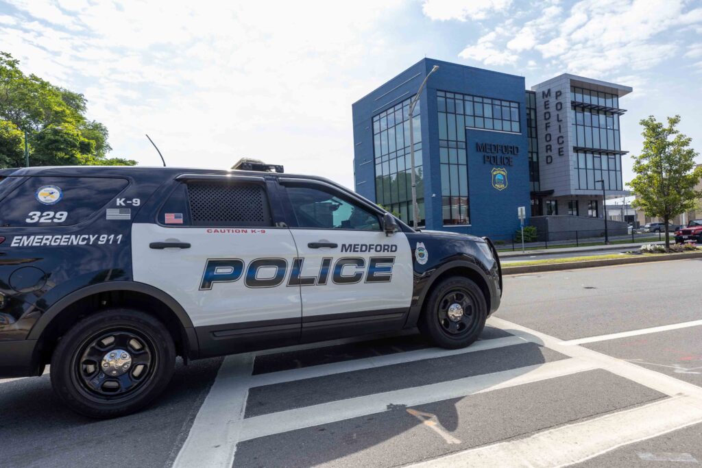 Medford Police Cruiser parked outside the headquarters.